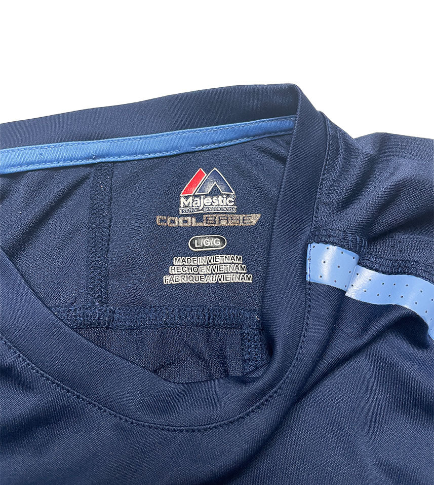Navy blue sports shirt with a Majestic logo on a white background
