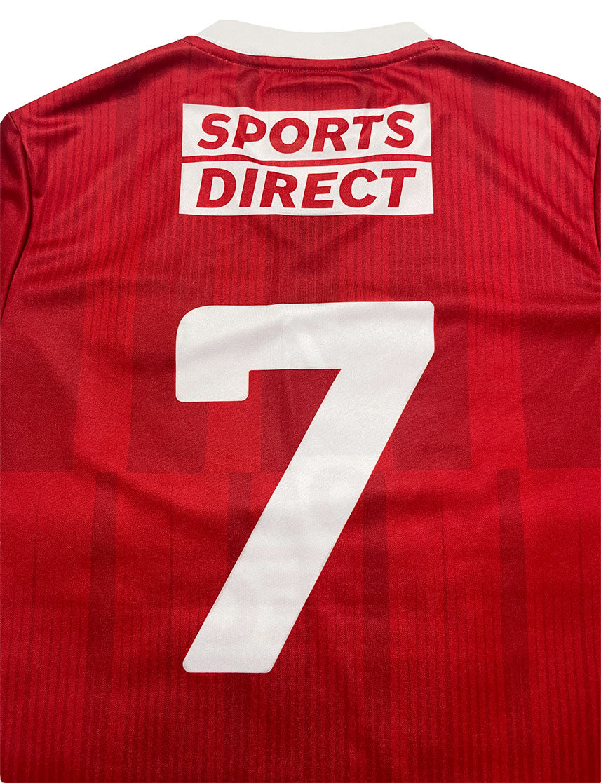 Red sports jersey with number 7 and Sports Direct logo on a white background